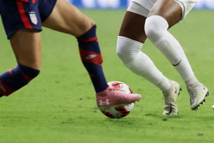 Soccer Football - Concacaf Women Championship - Final - United States v Canada - Estadio BBVA, Monterrey, Mexico - July 18, 2022 Canada's Kadeisha Buchanan in action with Emily Fox of the U.S. and Lindsey Horan of the U.S. Photo by Pilar Olivares/REUTERS