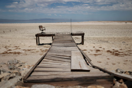 A former dock is seen on a Salton Sea's beach, with the water much further away, as California faces its worst drought since 1977, in Salton City, California, U.S., July 4, 2021. Photo by Aude Guerrucci/REUTERS