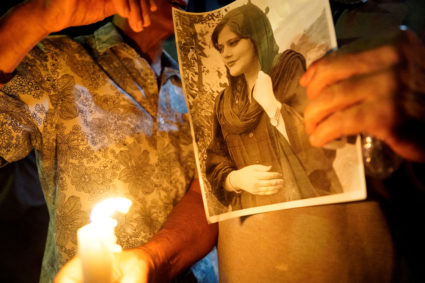 An image of Zhina Mahsa Amini at a candlelit vigil following her death, outside the Wilshire Federal Building in Los Angeles, California, U.S., September 22, 2022. Photo by Bing Guan/REUTERS