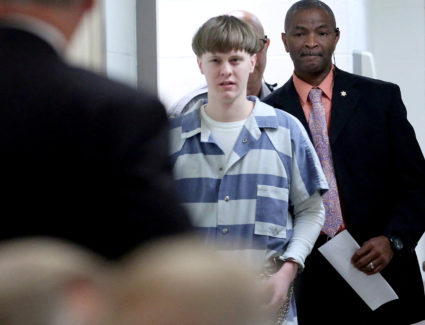 FILE PHOTO: Dylann Roof is escorted into the court room at the Charleston County Judicial Center to enter his guilty plea ...