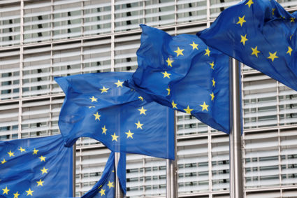 European Union flags flutter outside the EU Commission headquarters in Brussels, Belgium, on Sep.28, 2022. Photo by Yves Herman/Reuters
