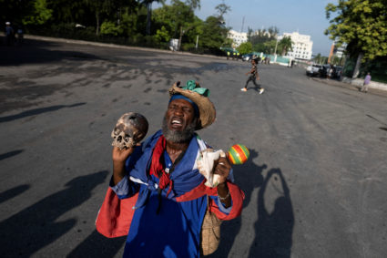 A man protests against Haitian Prime Minister Ariel Henry after he visited the National Pantheon Museum to honor revolutionary leaders Alexandre Petion and Jean Jacques Dessalines in Port-au-Prince, Haiti October 17, 2022. Photo by Ricardo Arduengo/REUTERS