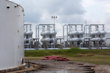 FILE PHOTO: An oil storage tank and crude oil pipeline equipment is seen during a tour by the Department of Energy at the ...