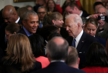 FILE PHOTO: U.S. President Biden and former U.S. President Obama speak about the Affordable Care Act and Medicaid at the W...