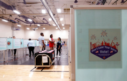 Clark County election department workers set up an early voting polling site in Las Vegas