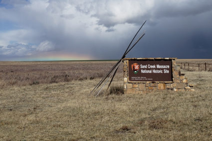 A short rainbow on the horizon at Sand Creek. Photo by Teri Jobe/National Park Service