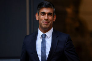 New leader of Britain's Conservative Party Rishi Sunak stands outside the party's headquarters in London, Britain, October 24, 2022. Photo by Henry Nicholls/REUTERS