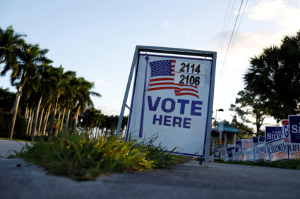 FILE PHOTO: Vote signs outside Palm Beach County Public Library polling station during the 2020 presidential election in P...