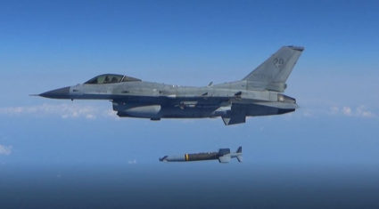 A South Korean Air Force's F-15K fires an air-to-surface missile towards north of its maritime border with North Korea