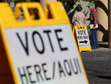 Voters enter a polling location, where allegedly others have had problems casting their voting ballot for the U.S. midterm elections, in Wickenburg, Arizona, U.S., November 8, 2022. Photo by Jim Urquhart/REUTERS
