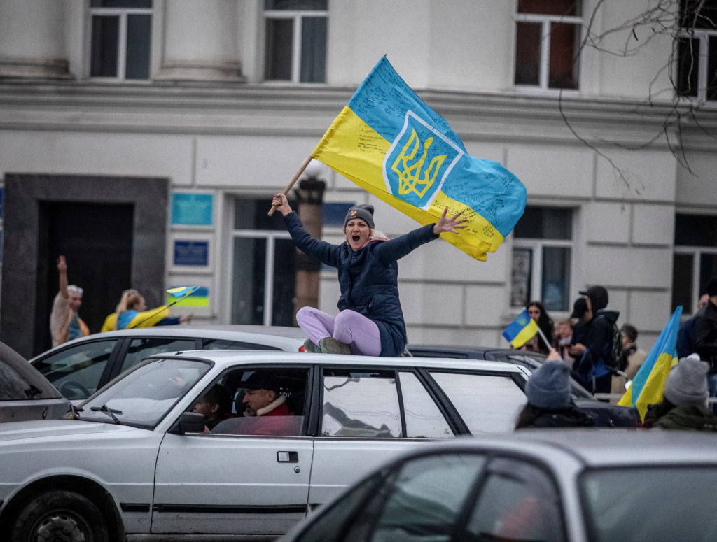 Local residents celebrate after Russia's retreat from Kherson, in central Kherson