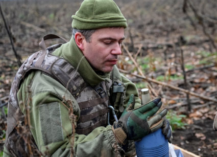 Ukrainian servicemen fire a mortar on a front line in Zaporizhzhia region