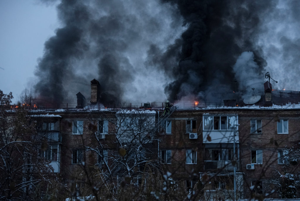 Rescuers work at a site of a residential building destroyed by a Russian missile attack, as Russia's attack on Ukraine continues, in the town of Vyshhorod, near Kyiv, Ukraine, November 23, 2022. Photo by Vladyslav Musiienko/REUTERS