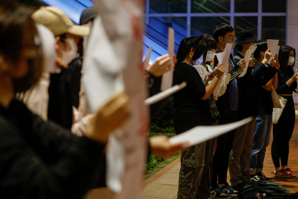 Protest over coronavirus disease restrictions in mainland China, during a commemoration of the victims of a fire in Urumqi...