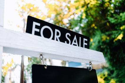 For Sale Sign in Front Yard of House. File Photo provided by Getty Images