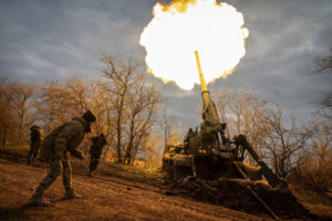 Ukrainian servicemen fire a 2S7 Pion self-propelled gun at a position on a frontline in Kherson region