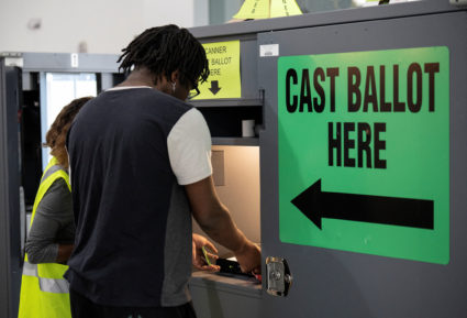 A voter casts his ballot for midterm elections at a polling station in Marietta, Georgia, U.S., November 8, 2022. Photo by Bob Strong/REUTERS