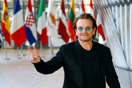Bono, U2 singer and co-founder of the One campaign. gestures before a meeting with European Council President Donald Tusk ...