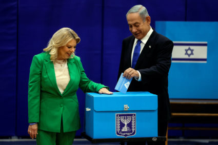 Former Israeli Prime Minister Netanyahu casts his ballot on the day of Israel's general election in a polling station in J...