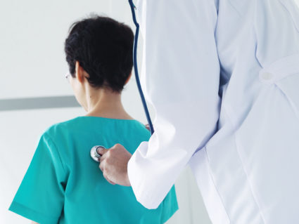 Doctor Examining Boy