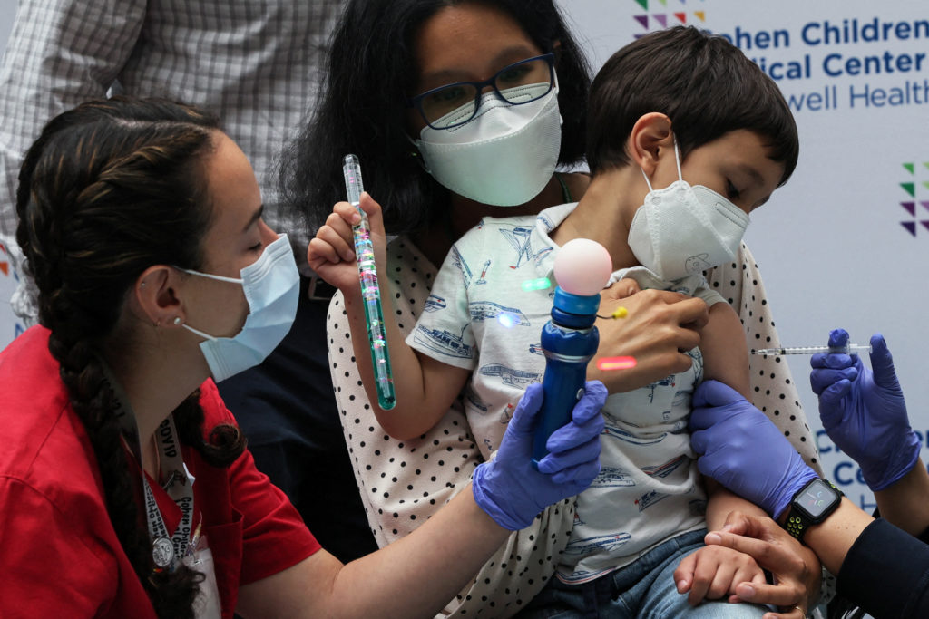 Kevin Lazarus, 4, receives the vaccine against the coronavirus disease (COVID-19) at Northwell Health's Cohen Children's M...