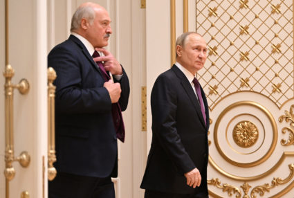 Russian President Vladimir Putin and Belarusian President Alexander Lukashenko attend a news conference in Minsk