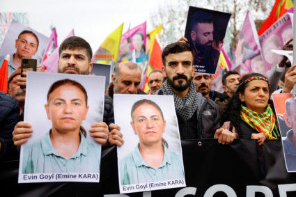 Members of the Kurdish community gather at Place de la Republique square following the shooting, in Paris