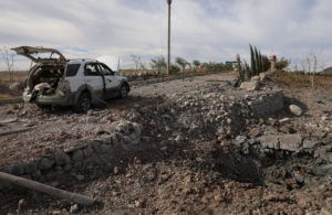 Aftermath after Turkish warplanes carried out air strikes, in Derik countryside