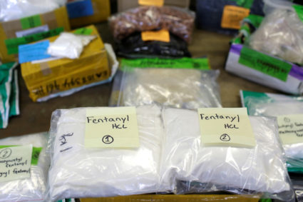Plastic bags of Fentanyl are displayed on a table at the U.S. Customs and Border Protection area at the International Mail...