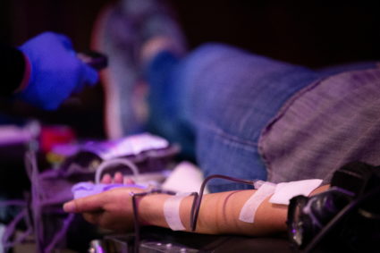 A person donates blood at a Red Cross blood drive at The Magic Castle during the outbreak of the coronavirus disease (COVI...