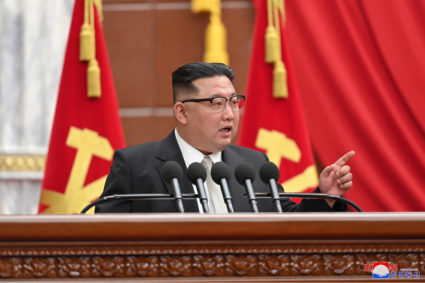 North Korean leader Kim Jong Un attends a session of the sixth enlarged meeting of the eighth Central Committee of the Wor...
