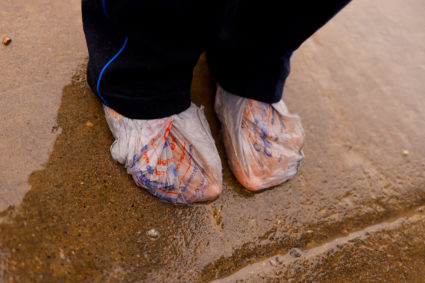 Asylum-seeking migrants cross the Rio Bravo river in Ciudad Juarez