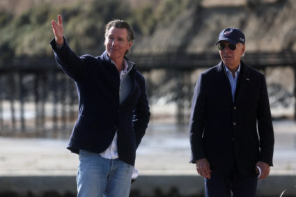 U.S. President Joe Biden looks on as he talks with California's Governor Gavin Newsom while visiting a storm-damaged pier in Capitola, California, U.S., January 19, 2023. Photo by Leah Mills/REUTERS