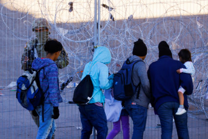 Members of the Texas National Guard stand guard on the banks of the Rio Bravo river with the purpose of reinforcing border...