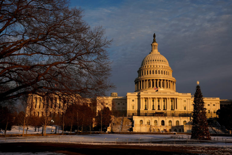 FILE PHOTO: The U.S. Capitol is seen at sunset on the eve of the first anniversary of the January 6, 2021 attack on the bu...