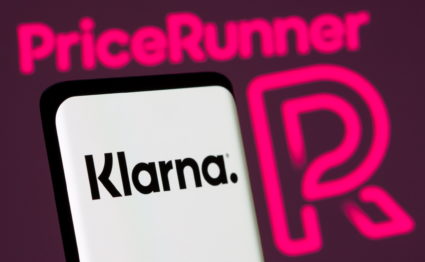 Klarna logo is seen on smartphone in front of displayed Pricerunner logo in this illustration