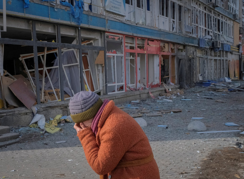 A local resident walks an empty street in Bakhmut