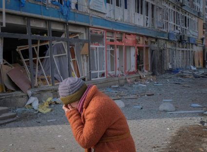 A local resident walks an empty street in Bakhmut