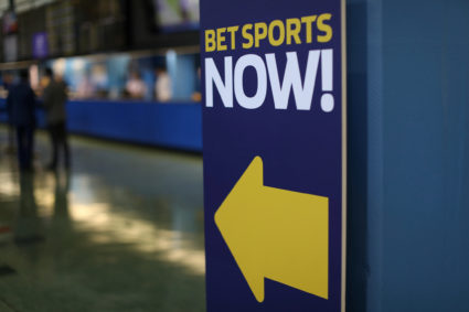 A sign is seen at Monmouth Park Sports Book by William Hill ahead of the opening of the first day of legal betting on spor...