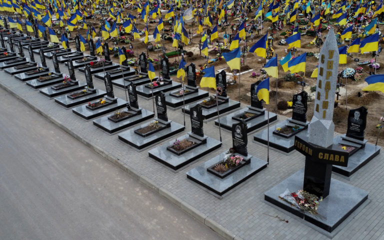 View shows graves of killed Ukrainian defenders at a cemetery in Kharkiv