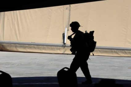 A U.S. soldier is seen during a handover ceremony of Taji military base from US-led coalition troops to Iraqi security forces, in the base north of Baghdad, Iraq August 23, 2020. Photo by Thaier Al-Sudani/REUTERS