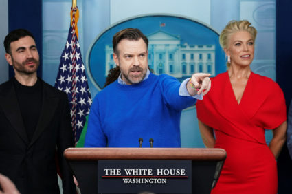 Cast of Ted Lasso join Press Secretary Karine Jean-Pierre at the daily press briefing at the White House in Washington