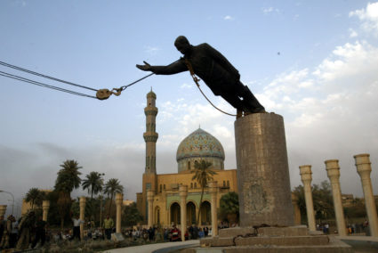 A STATUE OF PRESIDENT SADDAM HUSSEIN FALLS IN CENTRAL BAGHDAD.