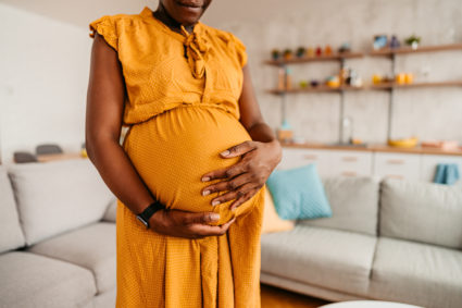 Black Woman Enjoying Pregnancy At Home