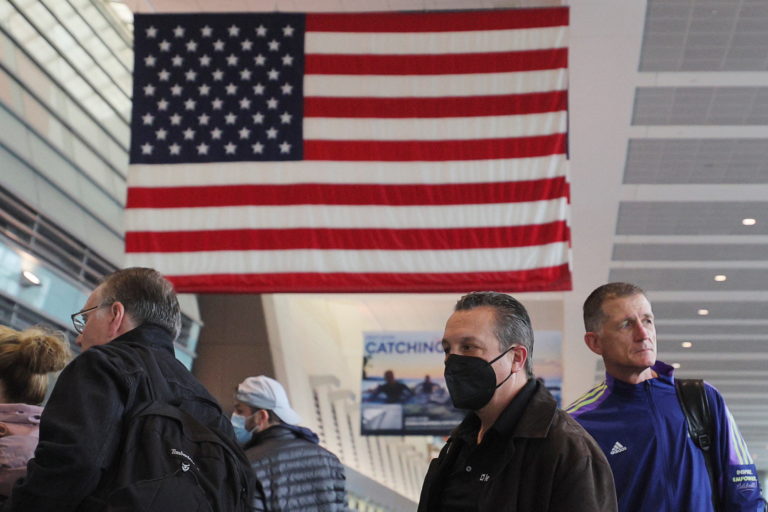 Travellers at Logan Airport after mask mandate struck down in Boston
