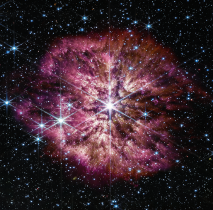 The luminous, hot star Wolf-Rayet 124 (WR 124) is prominent at the center of the James Webb Space Telescope’s composite image combining near-infrared and mid-infrared wavelengths of light from Webb’s Near-Infrared Camera and Mid-Infrared Instrument. Photo provided by NASA, ESA, CSA, STScI, Webb ERO Production Team