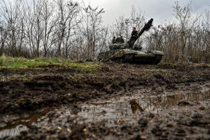 Ukrainian service members attend military drills near a frontline in Zaporizhzhia region