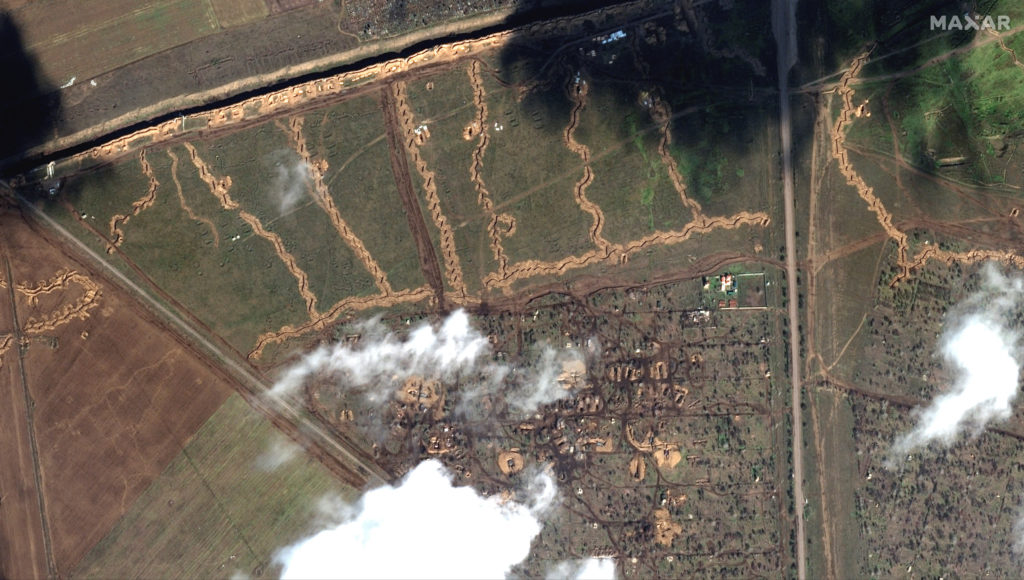 Satellite image of trenches and deployed Russian vehicles north of Armiansk, Crimea February 16, 2023 in this handout imag...