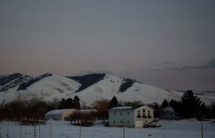 Snow covers the mountains as the sun sets in Missoula, Montana, U.S. February 24, 2023. Photo by Callaghan O'Hare/REUTERS