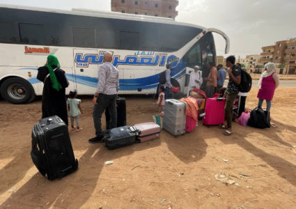 People flee clashes between the paramilitary Rapid Support Forces and the army in Khartoum
